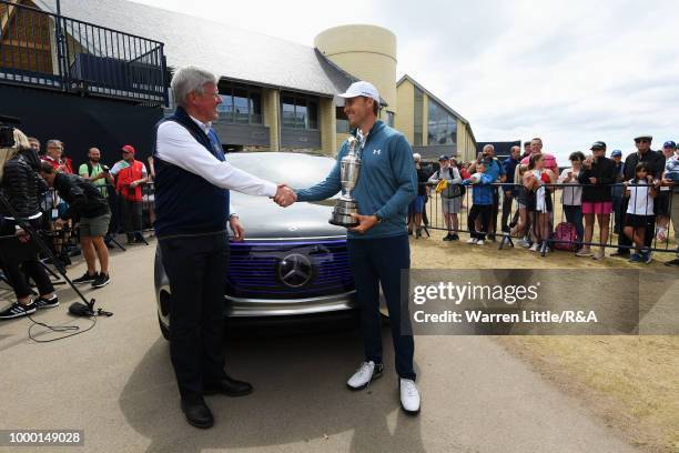 Jordan Spieth of the United States, winner of the 146th Open Championship, returns the Claret Jug to R&A Chief Executive, Martin Slumbers on the...