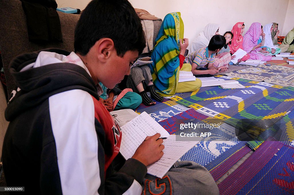 Pakistani displaced children attend a cl