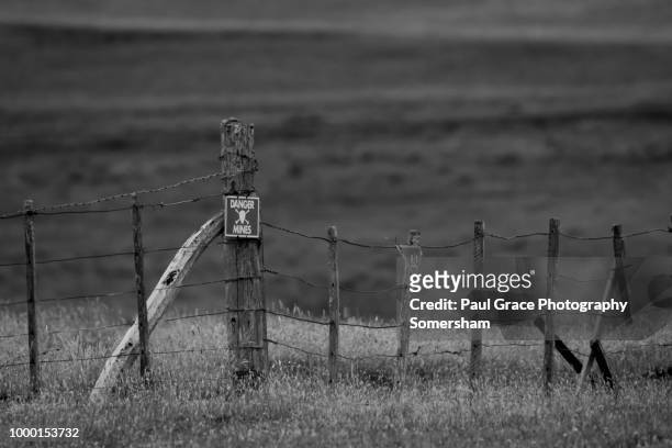 mine field in the falkland islands. - falklands war stock pictures, royalty-free photos & images