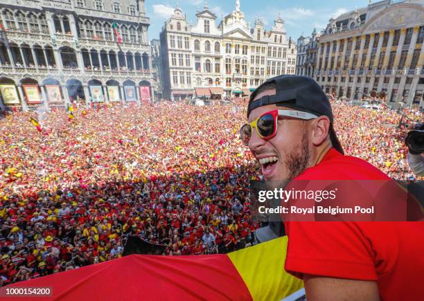 Belgian soccer team player Eden Hazard celebrates on the balcony of the city hall at the Brussels' Grand Place, after taking the third place in the...