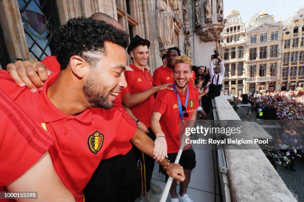 Belgian soccer team player Mousa Dembele celebrates on the balcony of the city hall at the Brussels' Grand Place, after taking the third place in the...