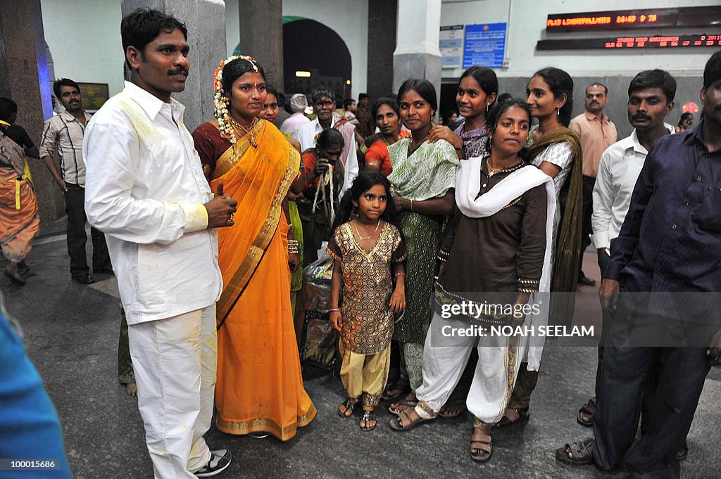 A newly married Indian couple (L) and re