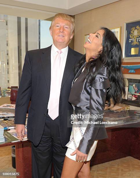 Donald Trump welcomes Miss USA 2010 Rima Fakih to his office in Trump Tower on May 20, 2010 in New York City.