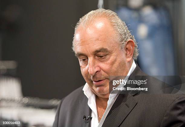 Sir Philip Green, the billionaire owner of Arcadia Group Ltd., pauses during a television interview at his new Topshop store in London, U.K., on...