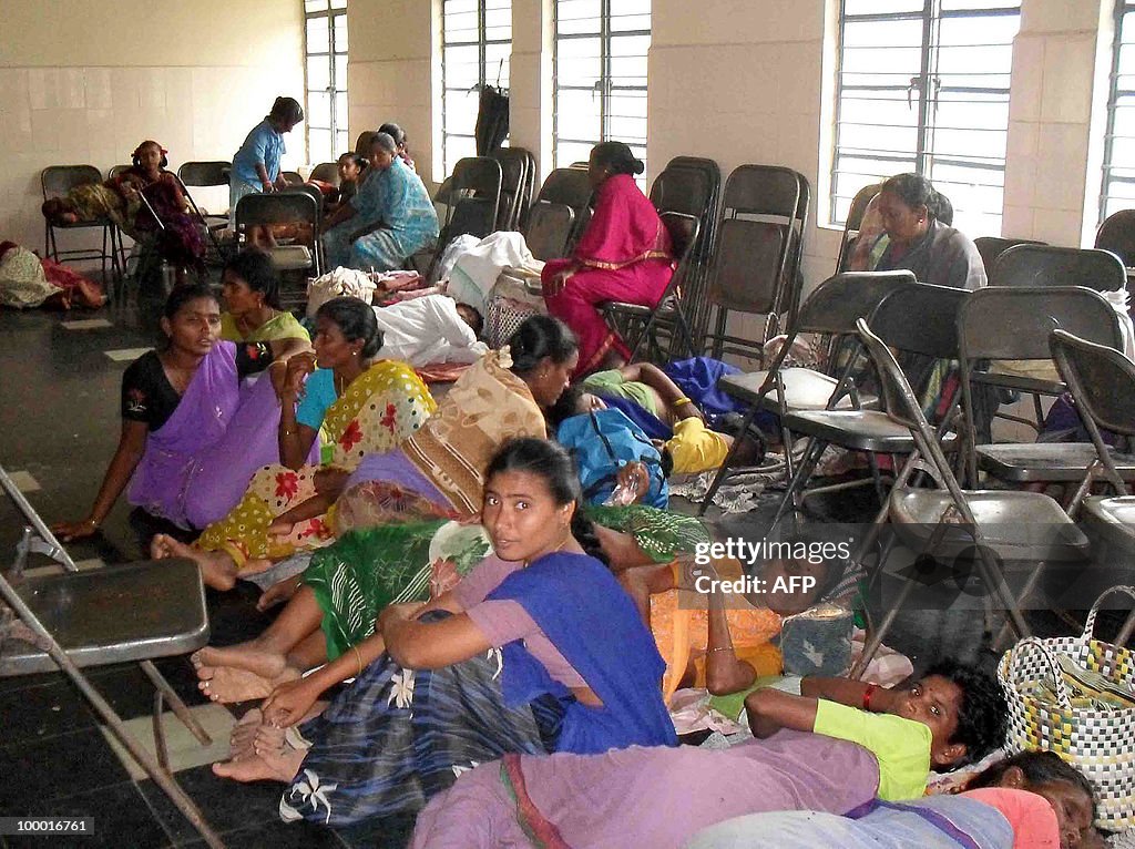 Indian people evacuated from a cyclone e