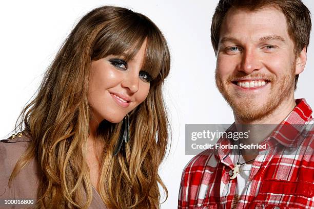 Singer Esmee Denters and Stanfour singer Konstantin pose for a picture at the backstage area of 'The Dome 54' at the Schleyerhalle on May 20, 2010 in...