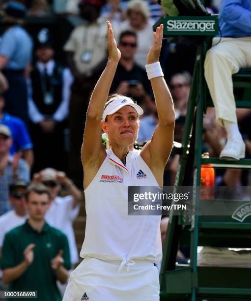 Angelique Kerber of Germany celebrates after beating Serena Williams of the United States in the ladies final at the All England Lawn Tennis and...