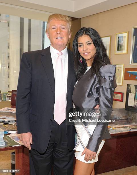 Donald Trump welcomes Miss USA 2010 Rima Fakih to his office in Trump Tower on May 20, 2010 in New York, City.