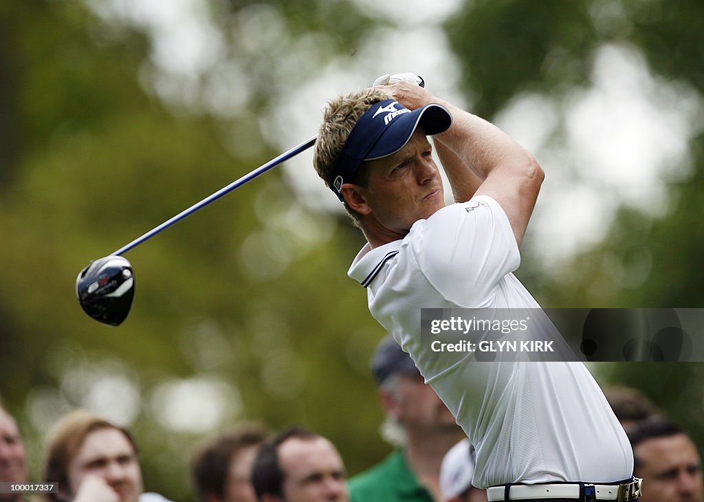 English golfer Luke Donald watches his d