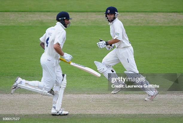 Neil McKenzie of Hampshire chases down the runs with Nic Pothas during the LV County Championship match between Nottinghamshire and Hampshire at...