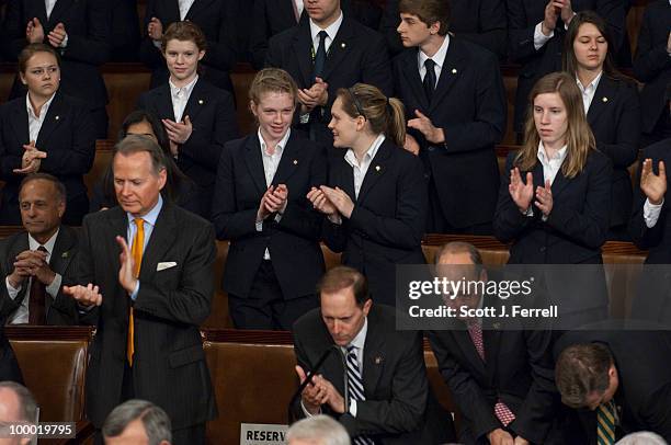 May 20: Members and Congressional pages applaud as Mexican President Felipe Calderon addresses a joint session of the U.S. Congress.