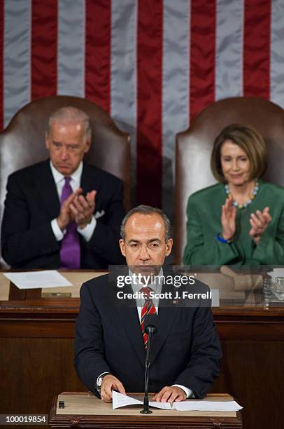 May 20: Mexican President Felipe Calderon addresses a joint session of the U.S. Congress. In background are Vice President Joseph R. Biden Jr., and...