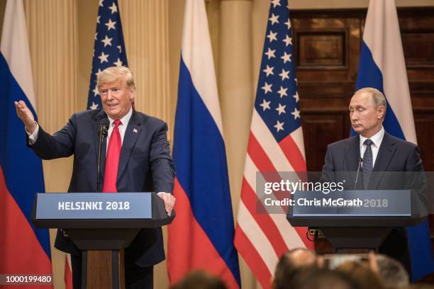 President Donald Trump and Russian President Vladimir Putin speak to the media during a joint press conference after their summit on July 16, 2018 in...