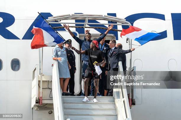 Paul Pogba and Benjamin Mendy of France during the arrival at Airport Roissy Charles de Gaulle on July 16, 2018 in Paris, France.