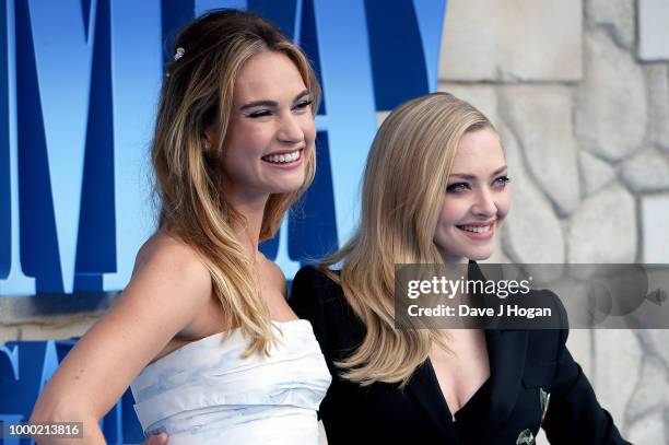 Lily James and Amanda Seyfried attend the UK Premiere of "Mamma Mia! Here We Go Again" at Eventim Apollo on July 16, 2018 in London, England.