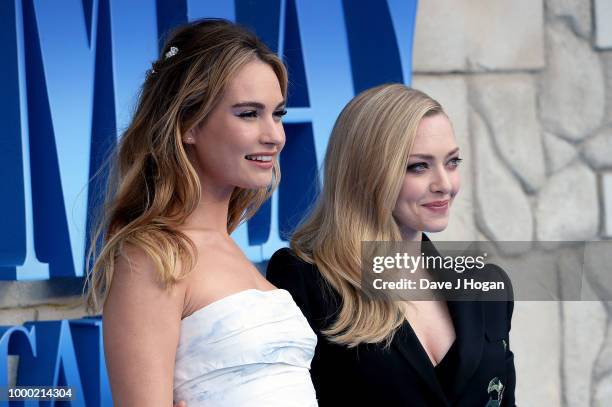 Lily James and Amanda Seyfried attend the UK Premiere of "Mamma Mia! Here We Go Again" at Eventim Apollo on July 16, 2018 in London, England.