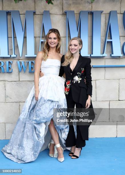 Lily James and Amanda Seyfried attend the UK Premiere of "Mamma Mia! Here We Go Again" at Eventim Apollo on July 16, 2018 in London, England.