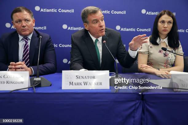 Sen. Mark Warner is joined by United Kingdom MP Damian Collins , Ukrainian MP Hanna Hopko and other European counterparts for a news conference at...