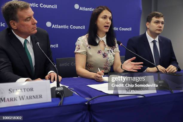 Sen. Mark Warner , Ukrainian MP Hanna Hopko and Czech Republic MP Jan Lipavsky join their European counterparts for a news conference at the Atlantic...