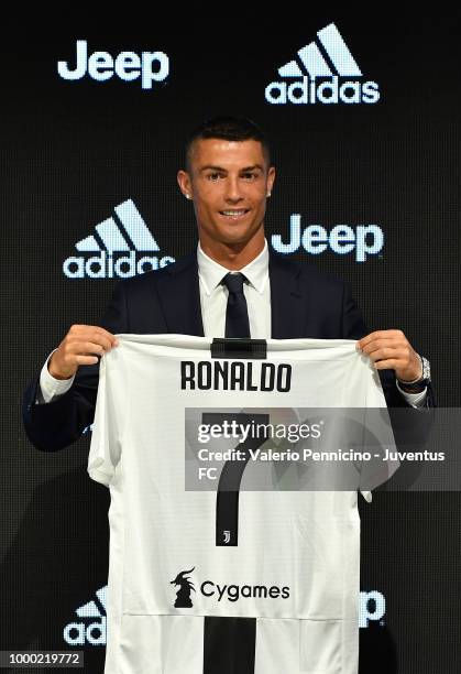 Juventus new signing Cristiano Ronaldo poses for the media during the press conference on July 16, 2018 in Turin, Italy.