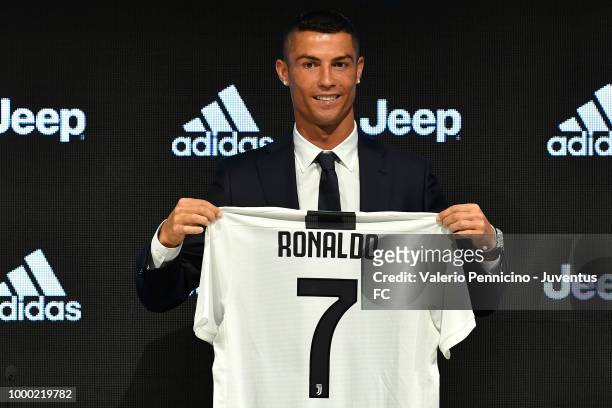 Juventus new signing Cristiano Ronaldo poses for the media during the press conference on July 16, 2018 in Turin, Italy.