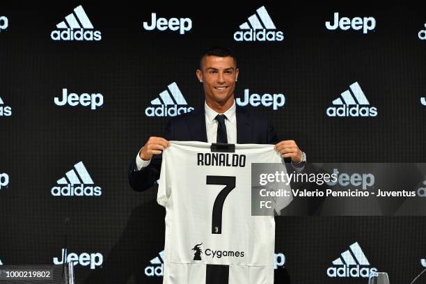 Juventus new signing Cristiano Ronaldo poses for the media during the press conference on July 16, 2018 in Turin, Italy.