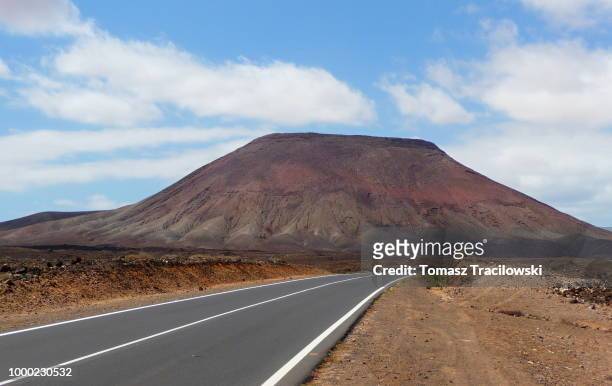 road to a volcano - tracilowski stock pictures, royalty-free photos & images