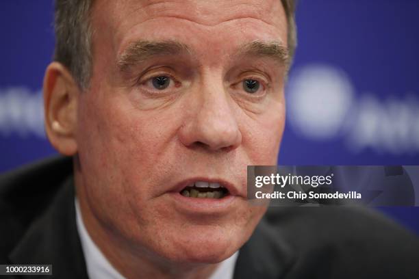 Sen. Mark Warner is joined by European counterparts for a news conference at the Atlantic Council July 16, 2018 in Washington, DC. The news...