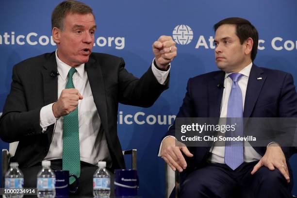 Sen. Mark Warner and Sen. Marco Rubio , both members of the Senate Intelligence Committee, participate in a discussion at the Atlantic Council July...