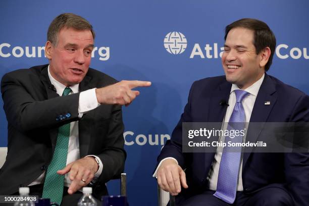 Sen. Mark Warner and Sen. Marco Rubio , both members of the Senate Intelligence Committee, participate in a discussion at the Atlantic Council July...