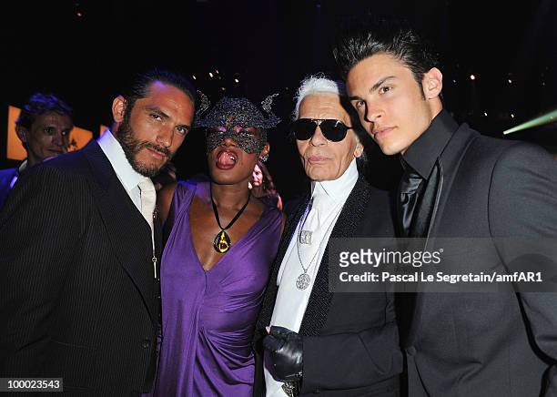 Grace Jones , Karl Lagerfeld and Baptiste Giabiconi attend amfAR's Cinema Against AIDS 2010 benefit gala dinner at the Hotel du Cap on May 20, 2010...