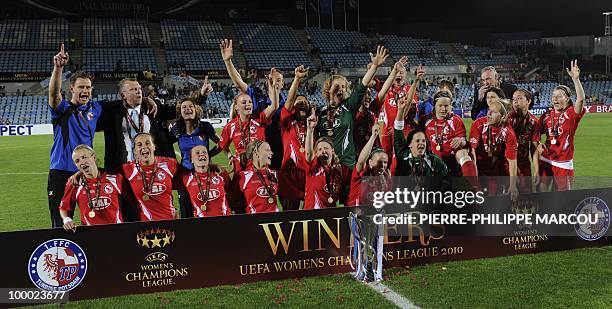 Turbine Potsdam's football players celebrate after wining their UEFA women's Final Champions League football match against Olympique Lyonnais at...