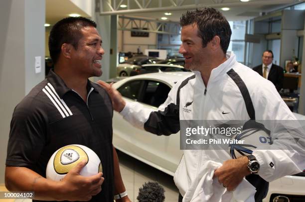 All Whites captain Ryan Nelsen and Keven Mealamu of the All Blacks chat during a breakfast held for the All Whites at Giltrap Prestige on May 21,...