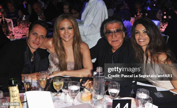 Marc Anthony, Jennifer Lopez, Roberto Cavalli, and Afef Jnifen attends amfAR's Cinema Against AIDS 2010 benefit gala dinner at the Hotel du Cap on...