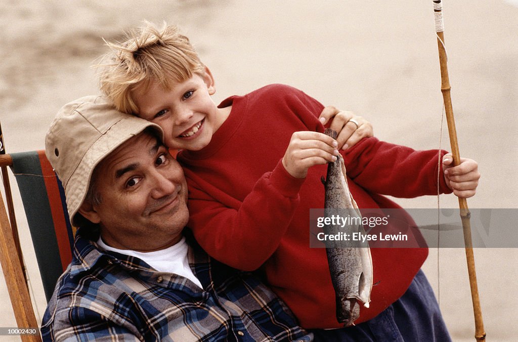 GRANDFATHER & BOY WITH FISH & POLE
