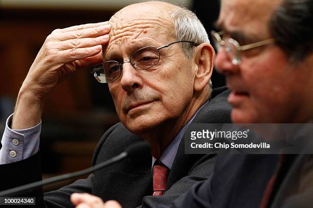 Supreme Court Associate Justice Stephen Breyer and fellow Associate Justice Antonin Scalia testifiy before the House Judiciary Committee's Commercial...