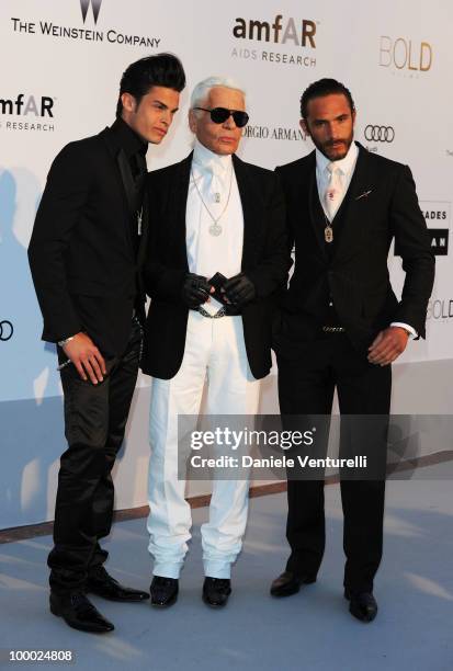 Baptiste Giabiconi, Karl Lagerfeld, Brad Kroenig arrive at amfAR's Cinema Against AIDS 2010 benefit gala at the Hotel du Cap on May 20, 2010 in...