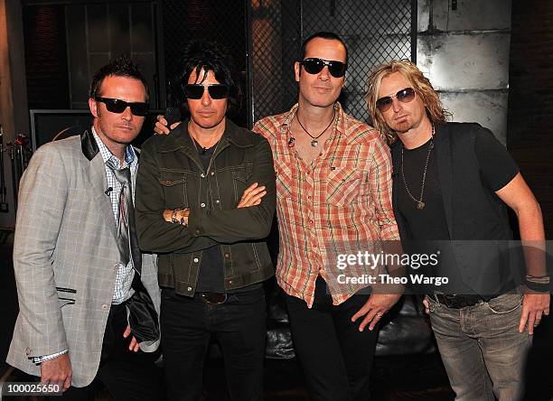 Musicians Scott Weiland, Dean DeLeo, Robert DeLeo and Eric Kretz of Stone Temple Pilots visit fuse Studios on May 20, 2010 in New York City.