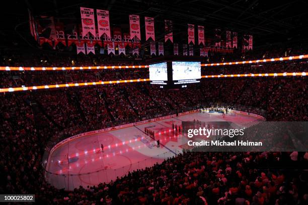 General view of fans and players stand at attention as Canada's National Anthem is performed prior to the start of Game 3 of the Eastern Conference...