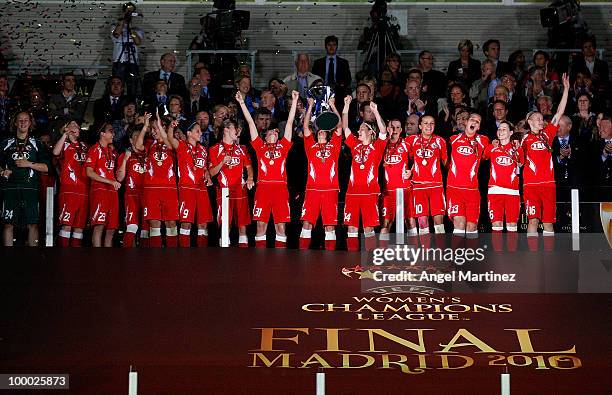 Jennifer Zietz of FFC Turbine holds up the trophy after the UEFA Women's Champions League Final match between Olympique Lyonnais and FFC Turbine...