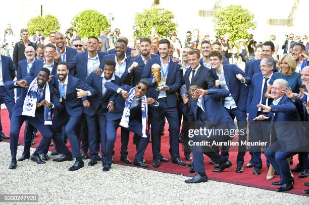 French President Emmanuel Macron receives the France football team during a ceremony at the Elysee Palace on July 16, 2018 in Paris, France. France...