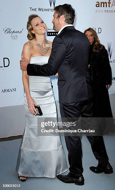 Charlene Wittstock and Gerard Butler arrive at amfAR's Cinema Against AIDS 2010 benefit gala at the Hotel du Cap on May 20, 2010 in Antibes, France.