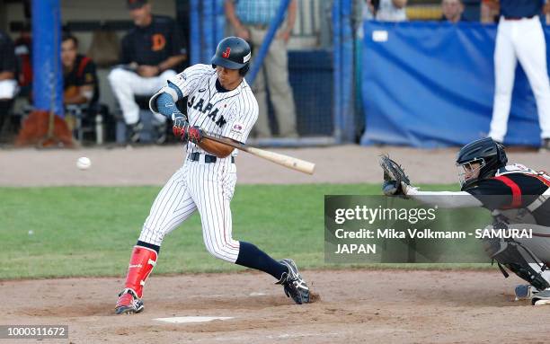 Teruaki Sato of Japan hits in the 7th inning during the Haarlem Baseball Week game between Japan and Germany at Pim Mulier Stadion on July 16, 2018...