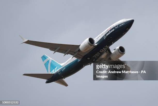 Boeing 737 Max gives a display during the opening day of the Farnborough International Airshow in Hampshire.