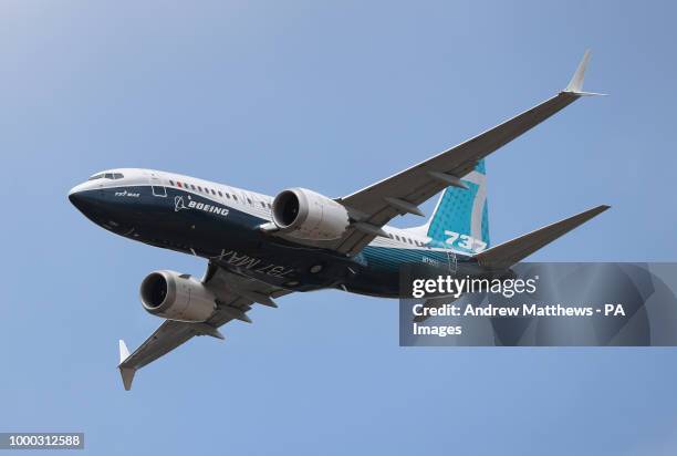 Boeing 737 Max gives a display during the opening day of the Farnborough International Airshow in Hampshire.