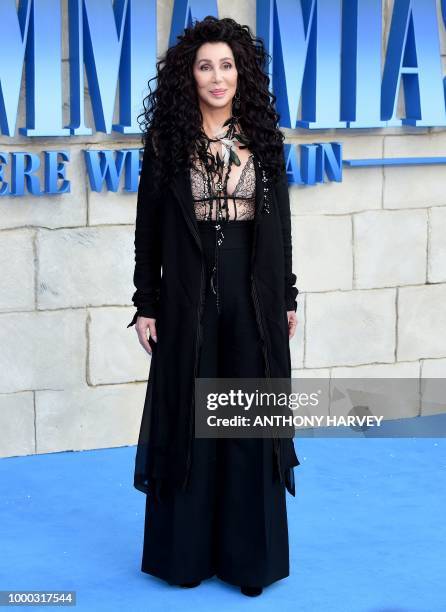 Cher poses on the red carpet upon arrival for the world premiere of the film "Mamma Mia! Here We Go Again" in London on July 16, 2018.