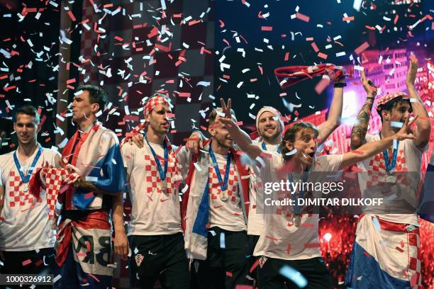 Croatian national football team players attend a welcoming ceremony at the Bana Jelacica Square in Zagreb on July 16 after reaching the final at the...