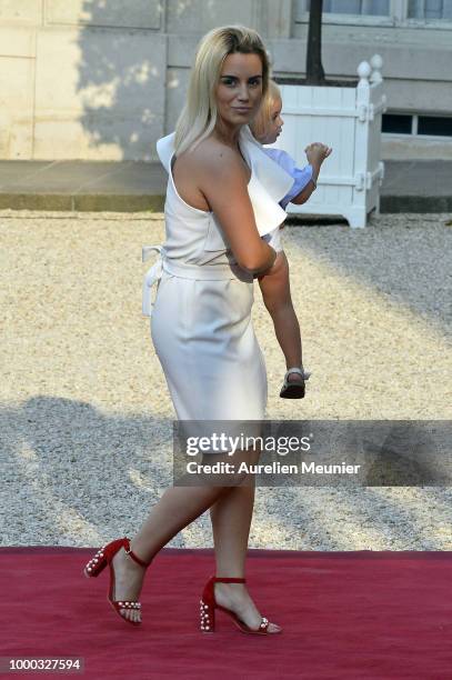 Antoine Griezmann's wife Erika Choperena arrives as French President Emmanuel Macron receives the France football team during a ceremony at the...