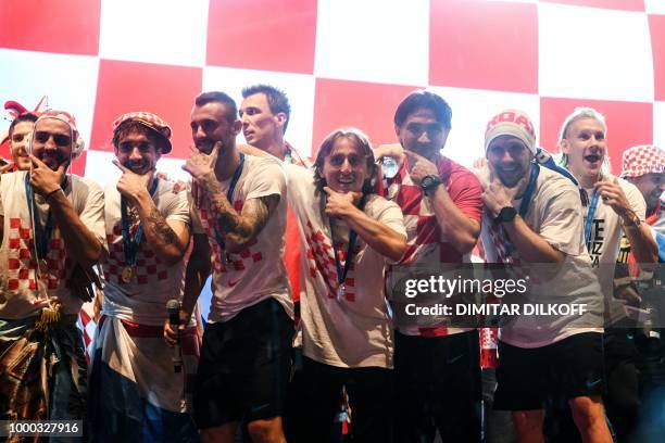 Croatian coach Zlatko Dalic and Luka Modric along with Croatian national football team players attend a welcoming ceremony at the Bana Jelacica...