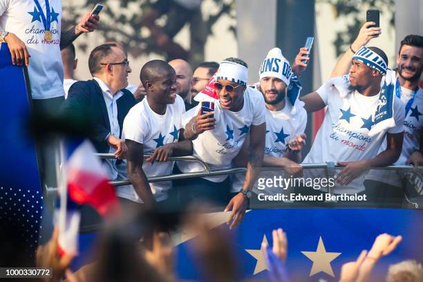 Golo Kante, Djibril Sidibe, Nabil Fekir, Hugo Lloris, professional football players, attend the France's World Cup Winning Team Parade Down The...